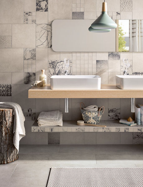 Grau ist nicht gleich Grau: Die Serie Thinsation von Steuler Fliesen überrascht in Wohn- und Badezimmern.