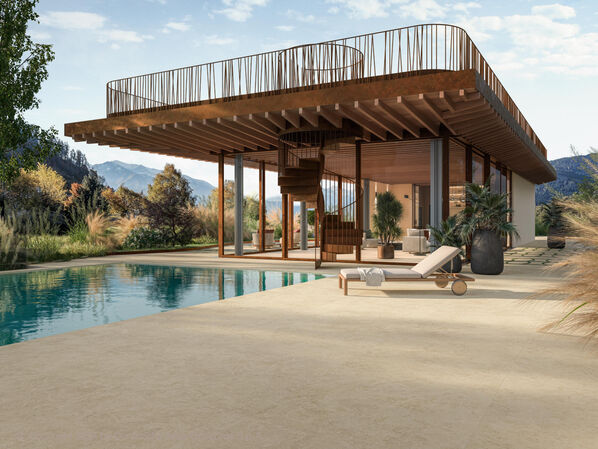 Große Terrasse mit ebenerdigen Pool und großem Designhaus. Der Terrassenboden ist in Kalksteinoptik ( Atlas Concorde Boost Icor Outdoor).